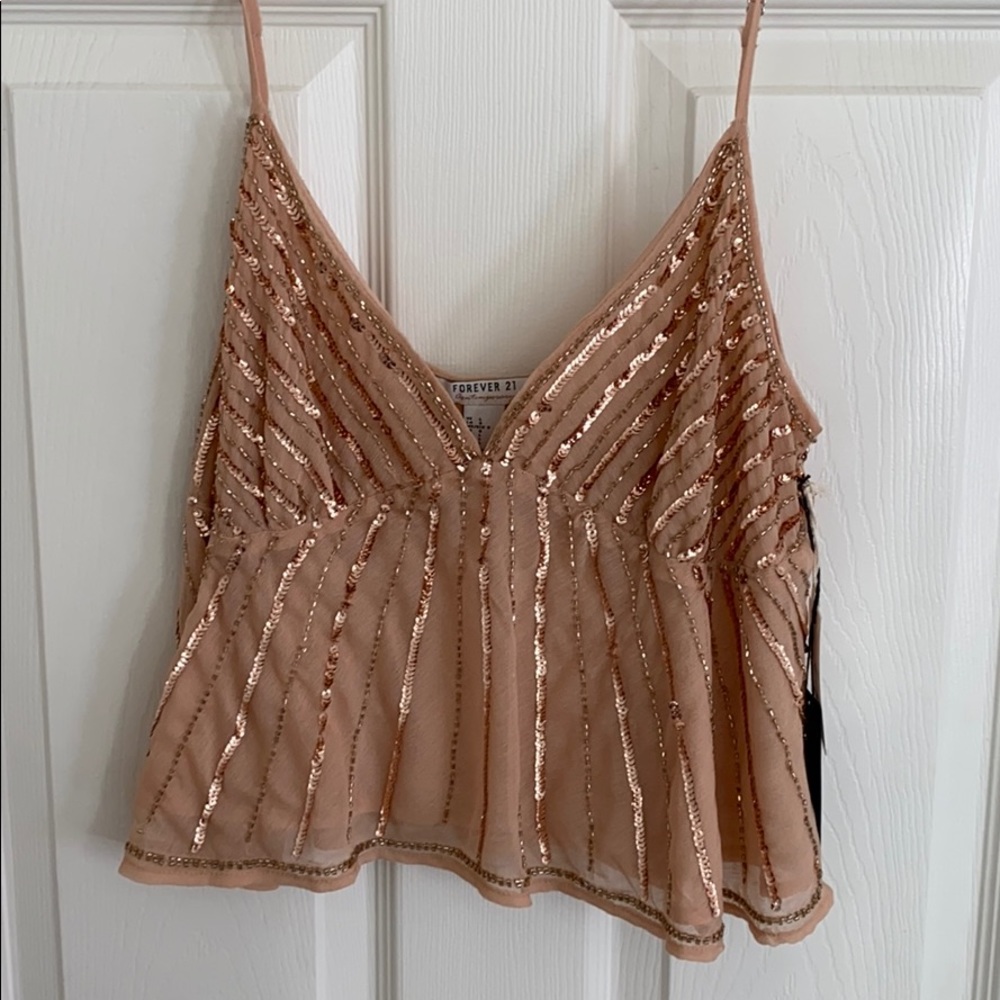 light pink loose crop top! never worn, has tags on